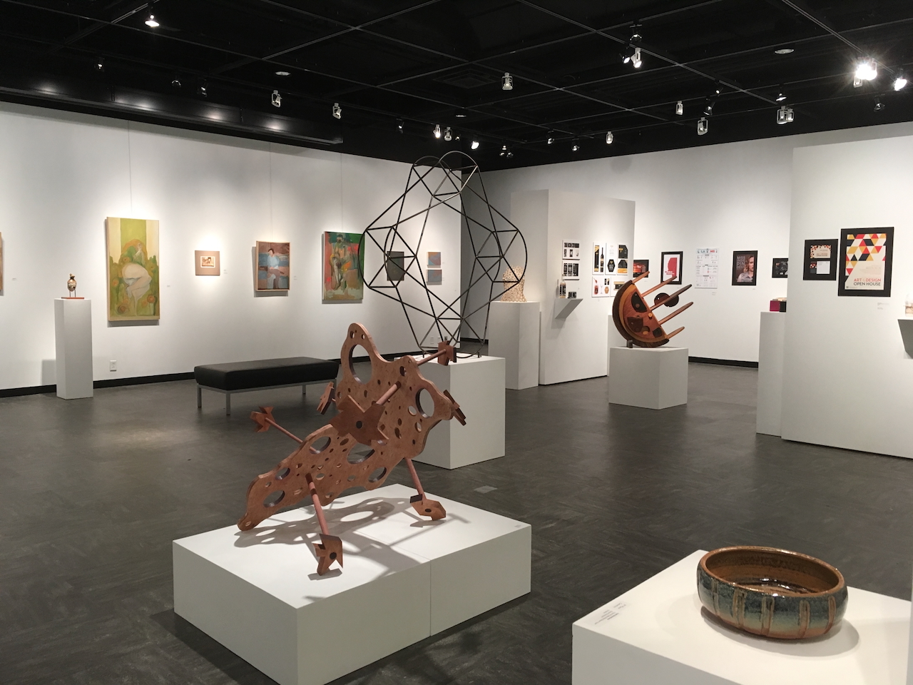 Art gallery with sculptures and paintings