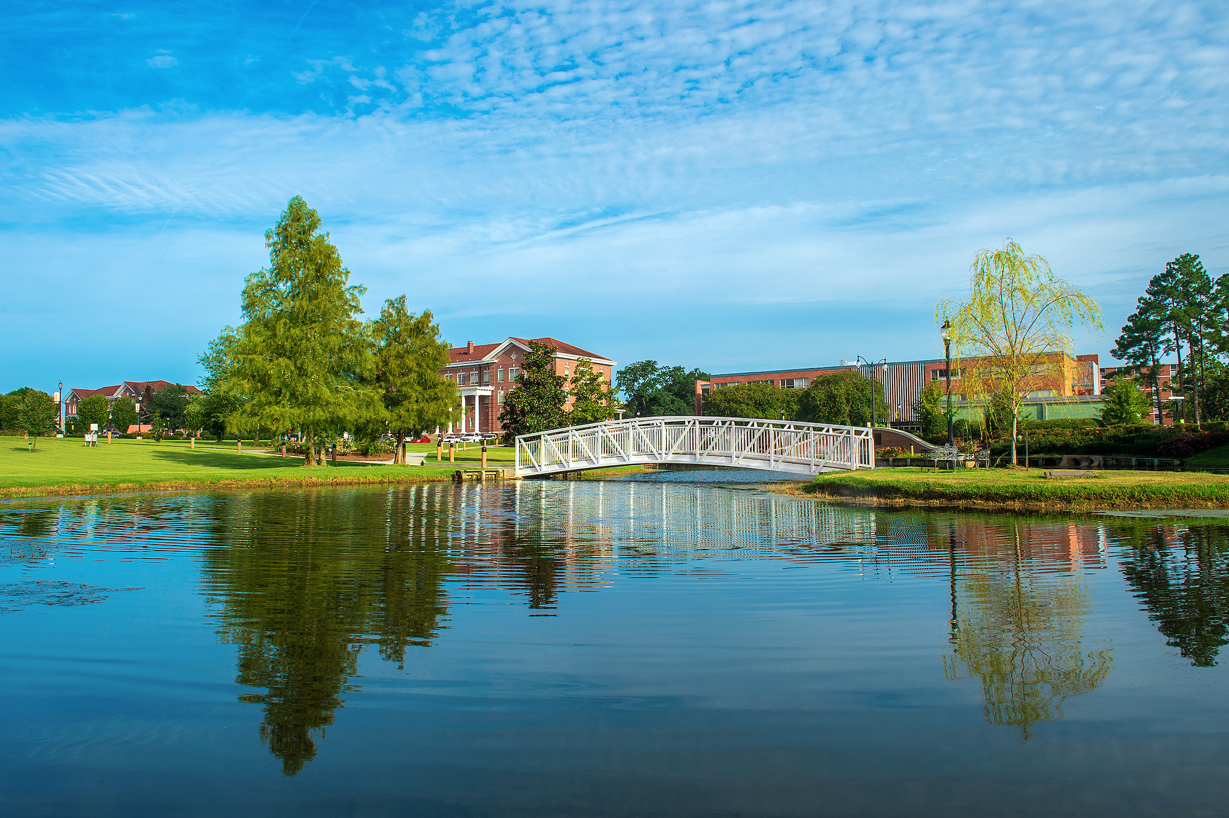 McLemore Hall, a historic office building sitting behind Lake Byron