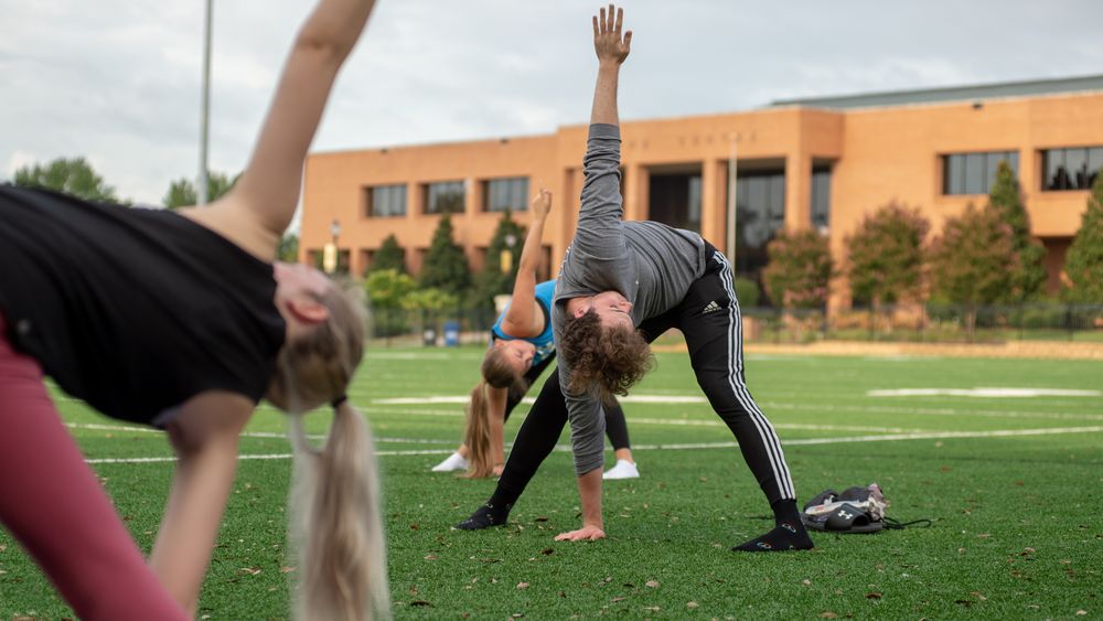 students doing yoga